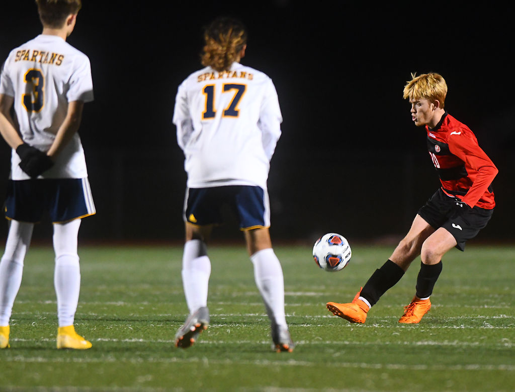Breck McGrail takes a free kick against Battle High School